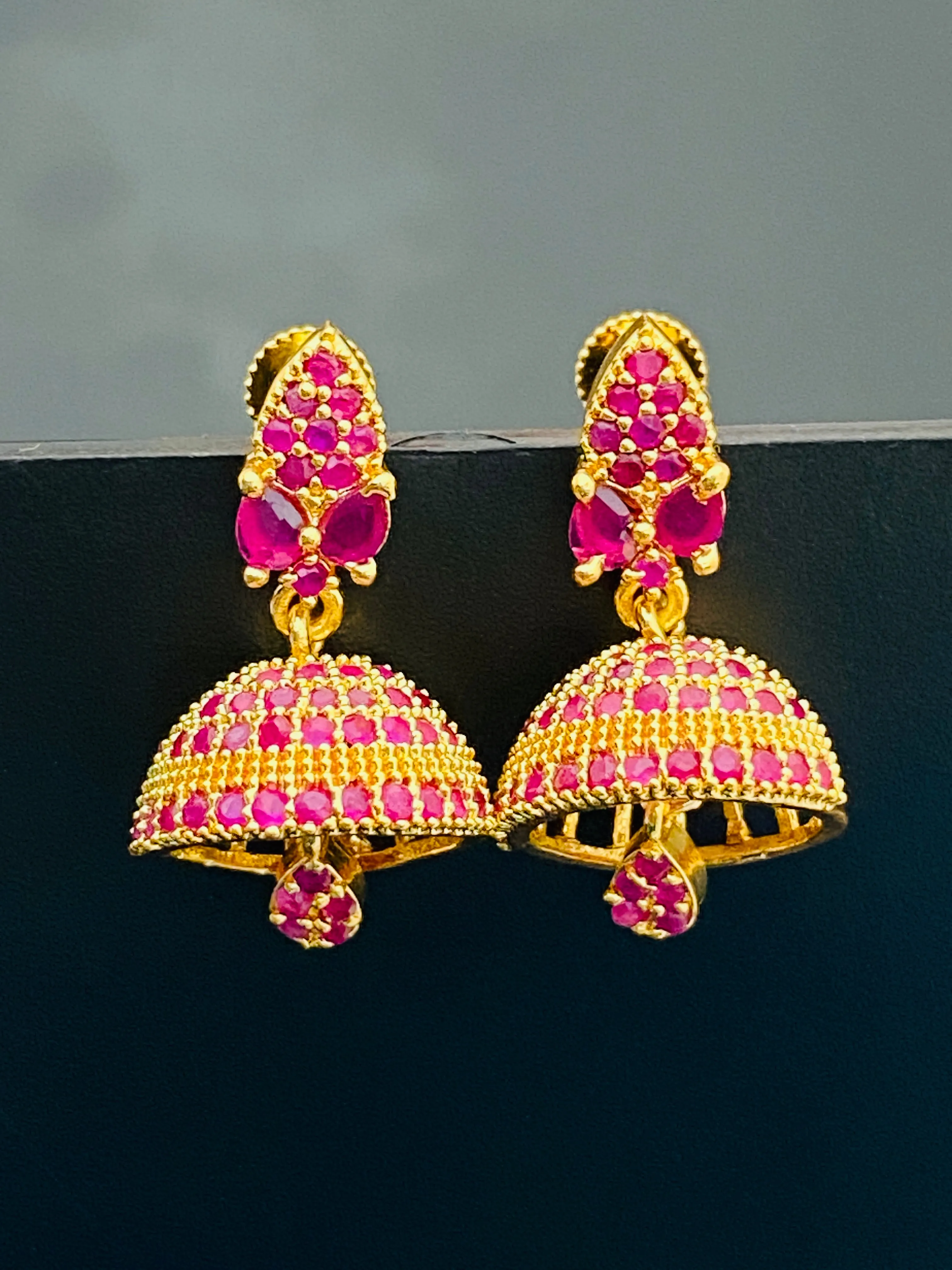 Elegant Ruby Stoned Gold Plated Jhumka Earrings